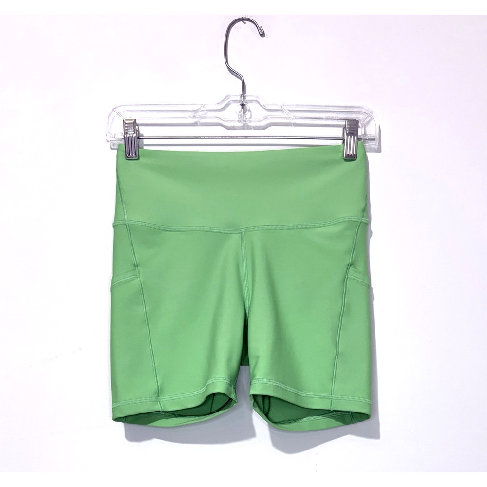 Athleta Interval Stash 5" Short Womens S Green Pocket Drawstring Logo